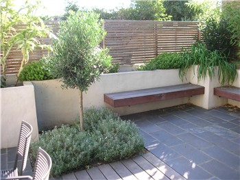 Cedar trellis is used along the neighbouring boundary to make a light screen